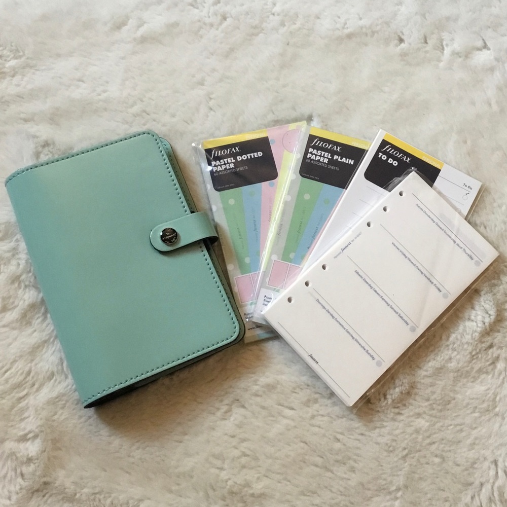 FiloFAX planner! Comes with a bunch of inserts